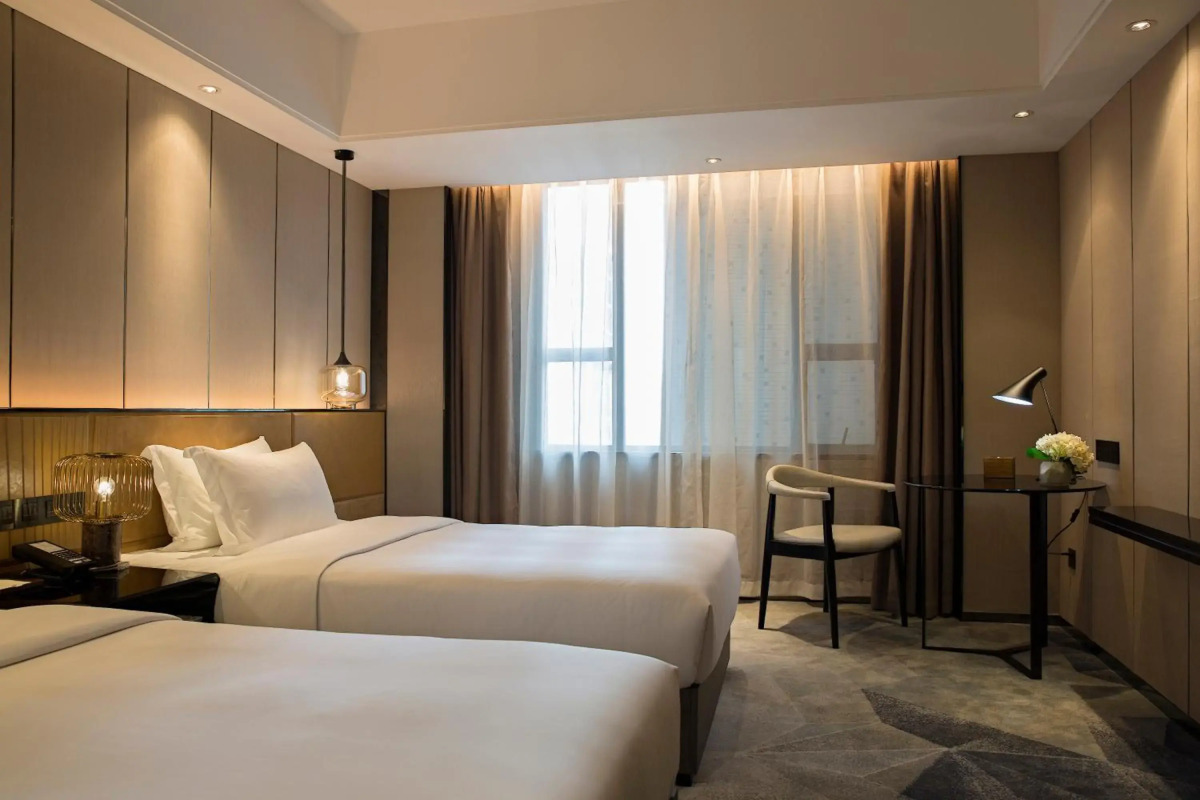 Paco Business Hotel Datang Metro Station