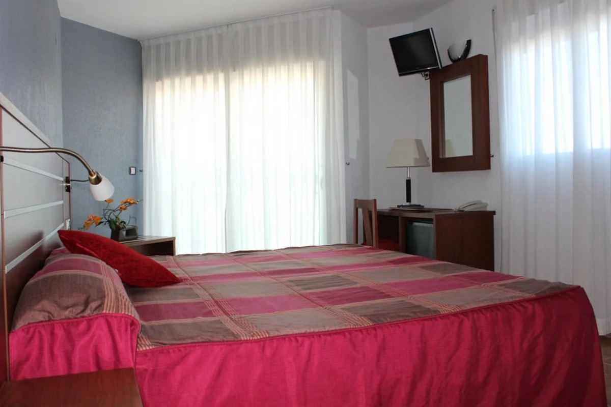 Hotel La Familia Gallo Rojo