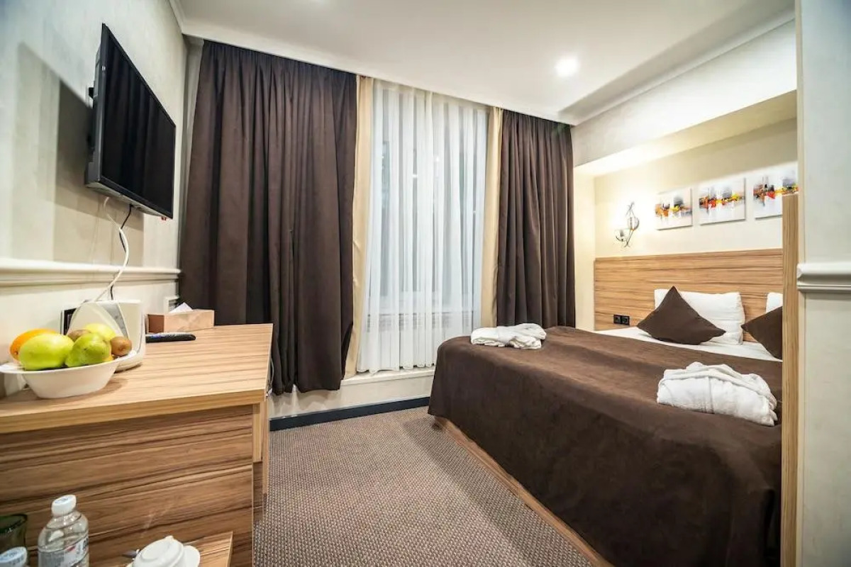 Отель Mildom City