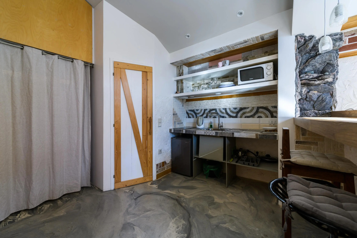 Апартаменты Оплот ETHNICA Дизайн Студия | 40м² | 3 Этаж Ваше Окно в Горы