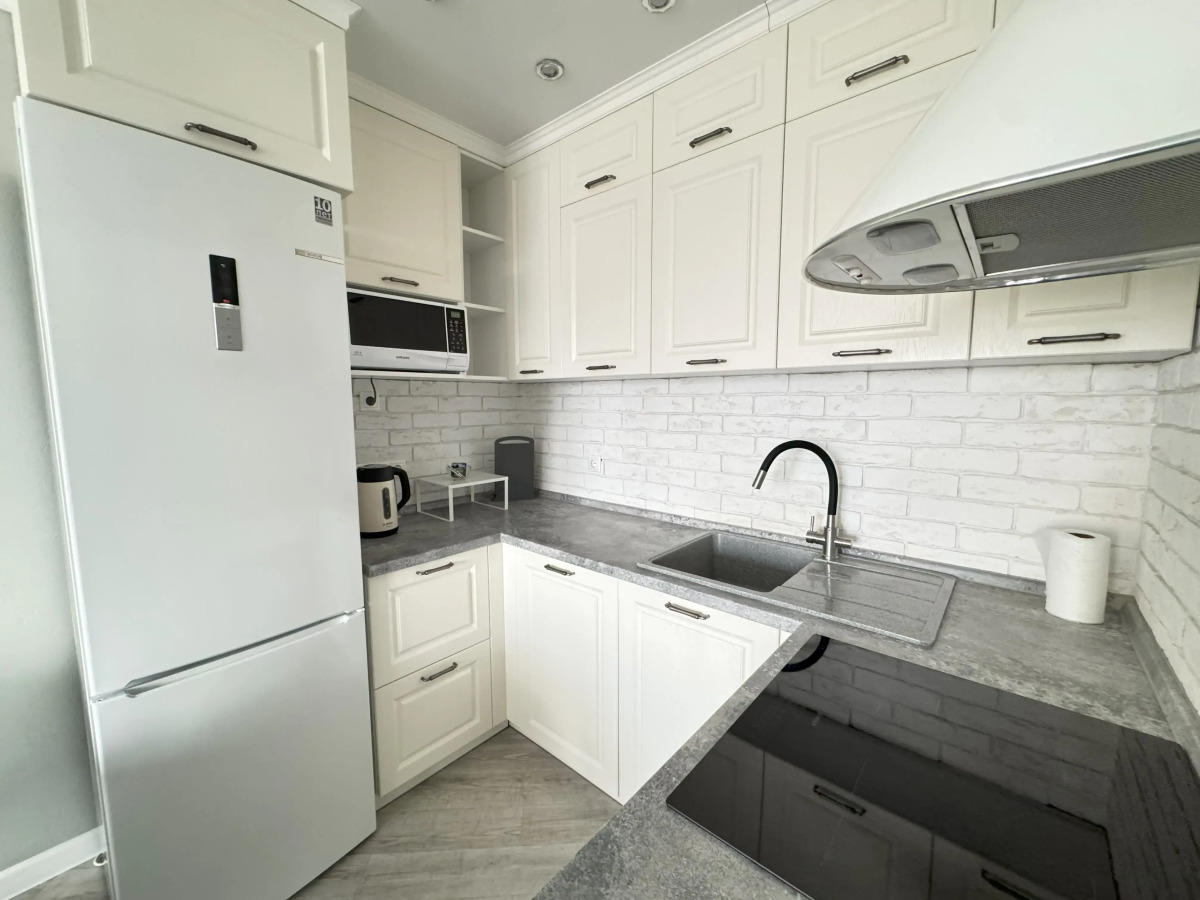 Апартаменты Четырехместная дизайнерская квартира в ЖК "Новин"