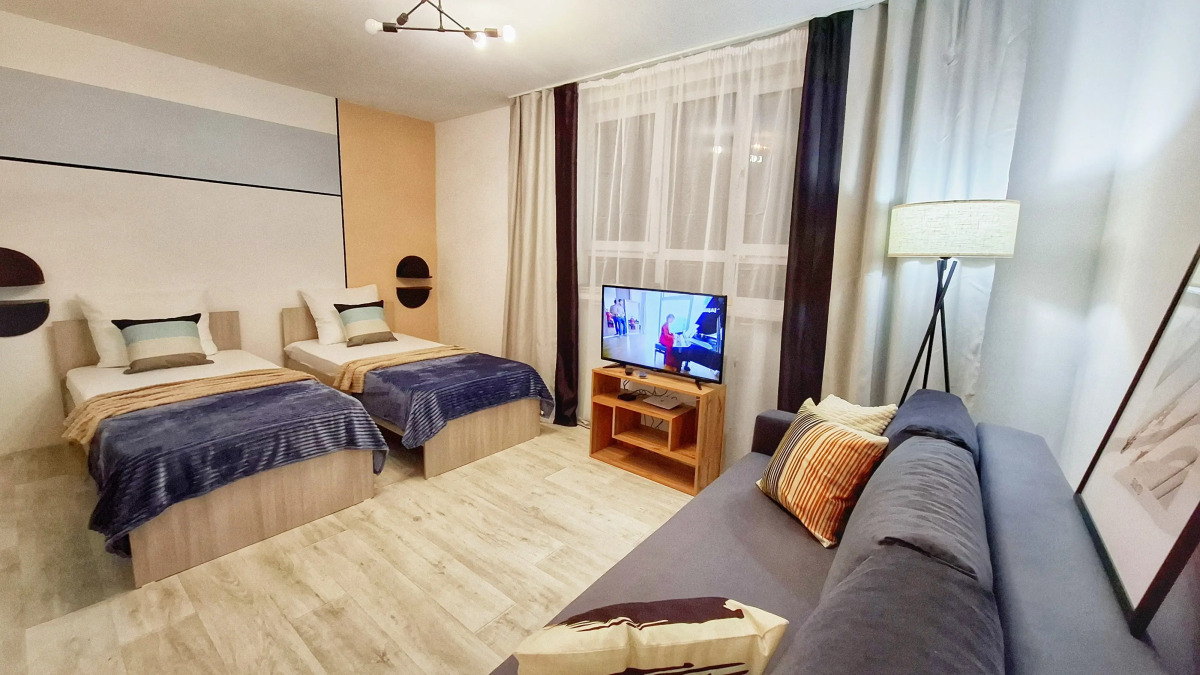 Апартаменты для большой семьи или компании в командировке с видом на Уральские горы