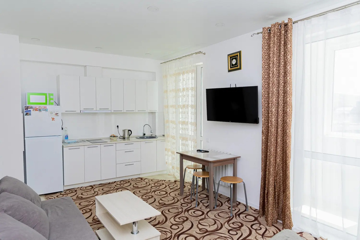 Апартаменты Современная студия на Мира 300