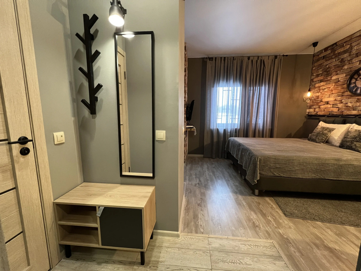 Апартаменты с Часами в Стиле Лофт