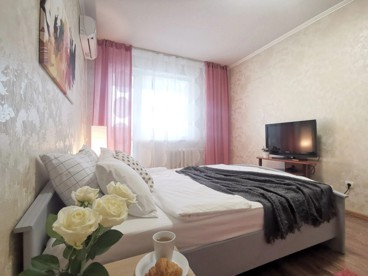 Апартаменты Уютная и светлая в самом центре города