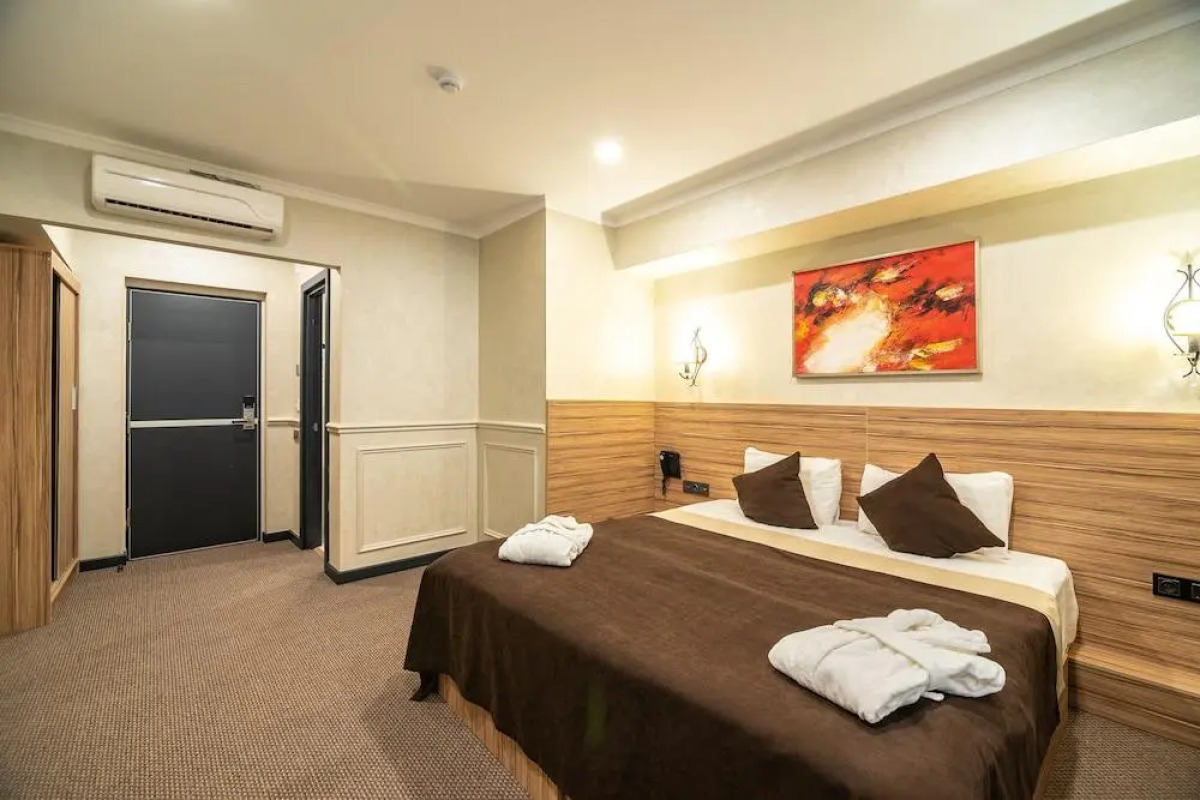 Отель Mildom City