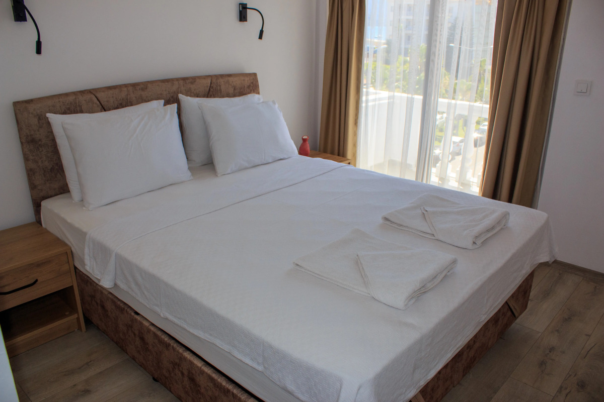 Отель Aloha Suites