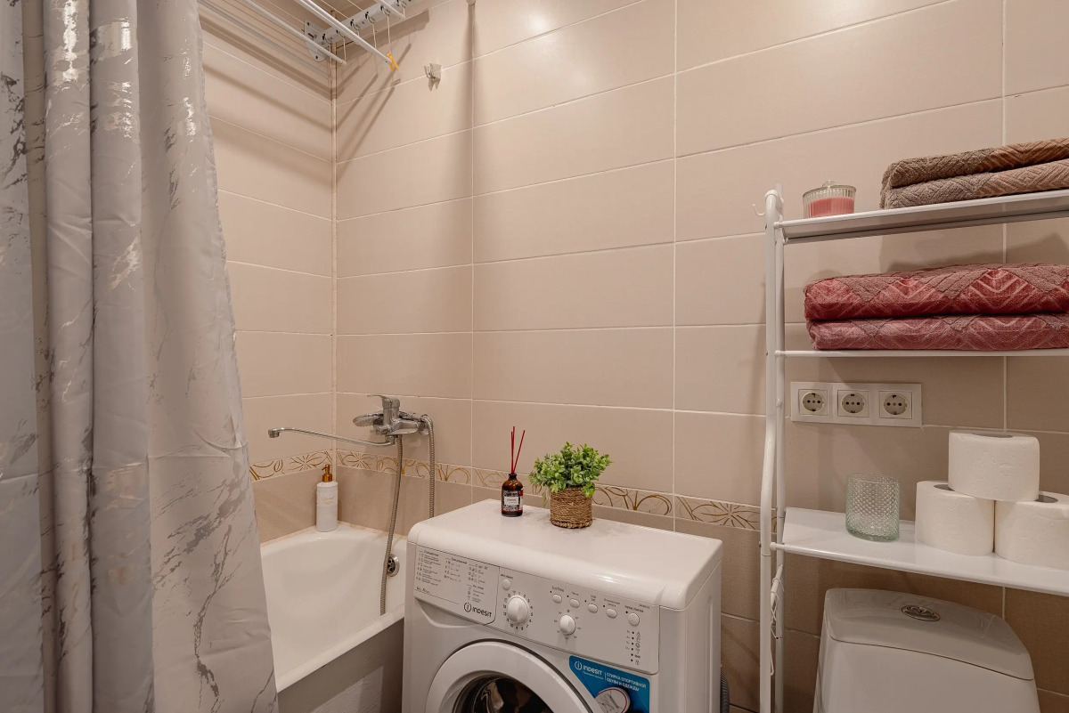 Апартаменты Уютная Студия у Ботанического Сада