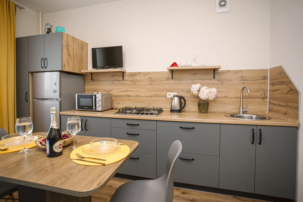 Апартаменты Ук Атмосфера Биpюза и coлнцe в Иcтopическом Центpе Яpославля