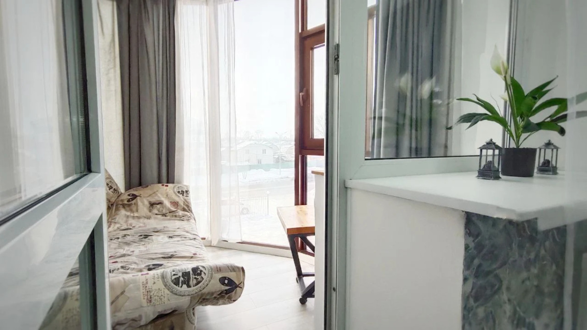 Квартира Guru c лаундж зоной на балконе