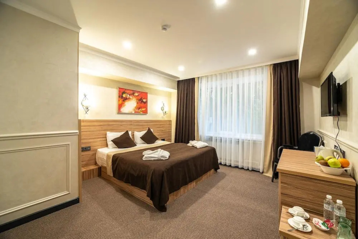 Отель Mildom City