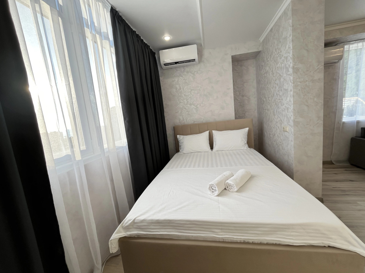 Квартира Апартаменты в Центре Гагры с Видом на Море и Горы