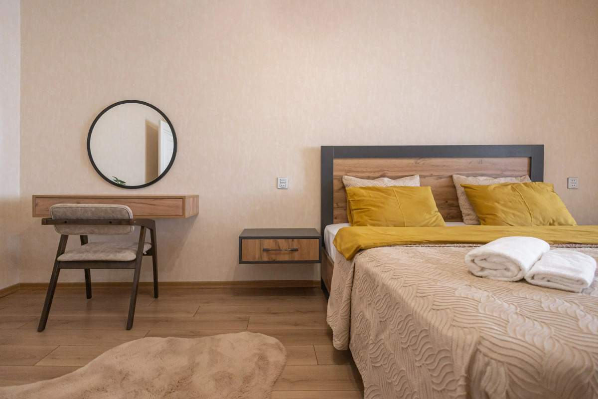 Апартаменты Двухспальные с Гостиной Комнатой в Центре Города