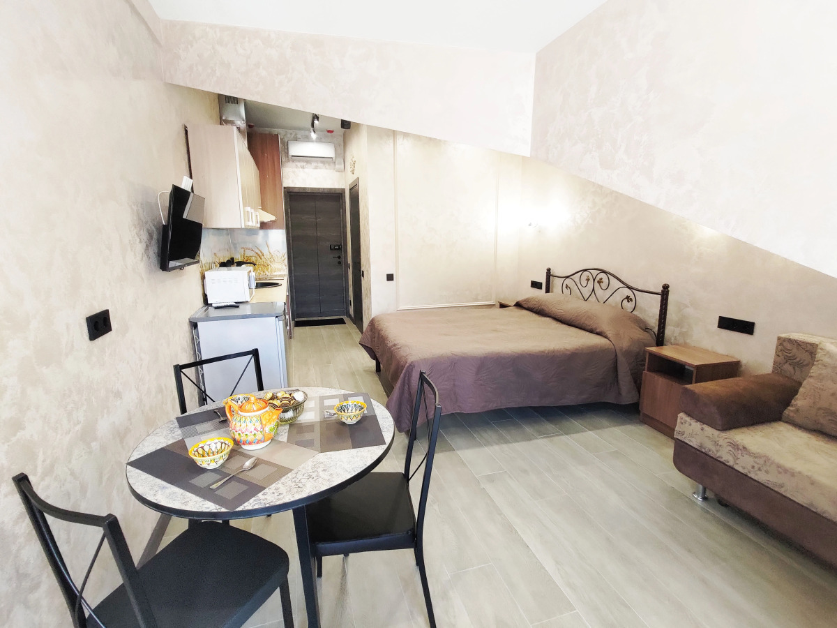 Апартаменты с Панорамным Видом на Горы и Открытым Балконом