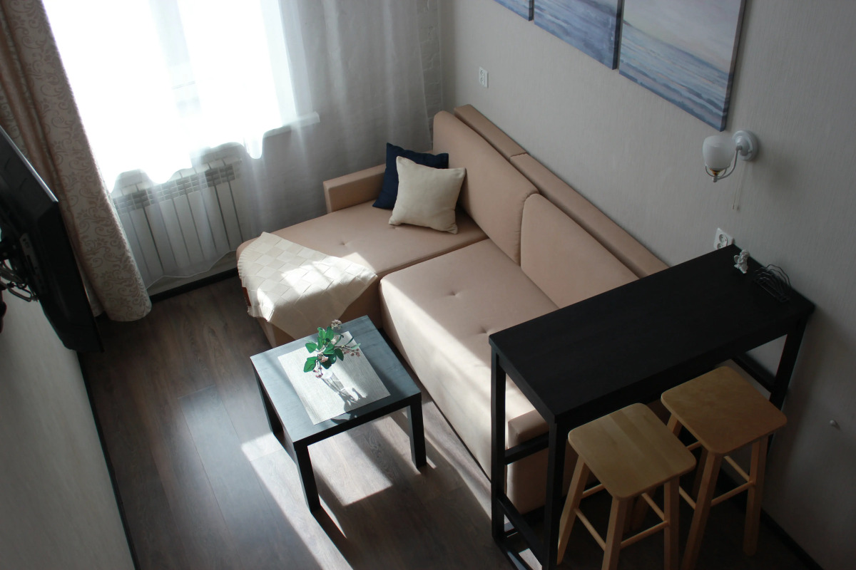 Апартаменты Уютная Двухуровневая Студия в Центре Города