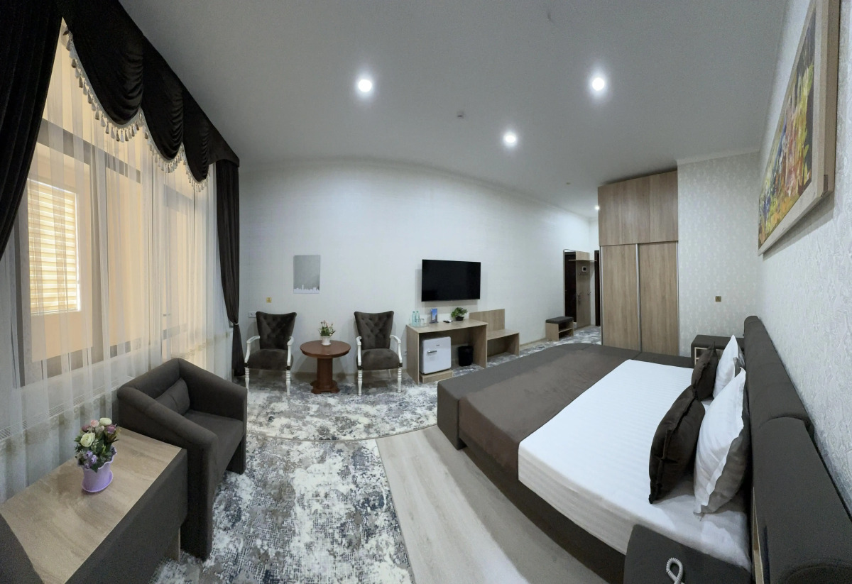 Отель Sharq Yulduzi