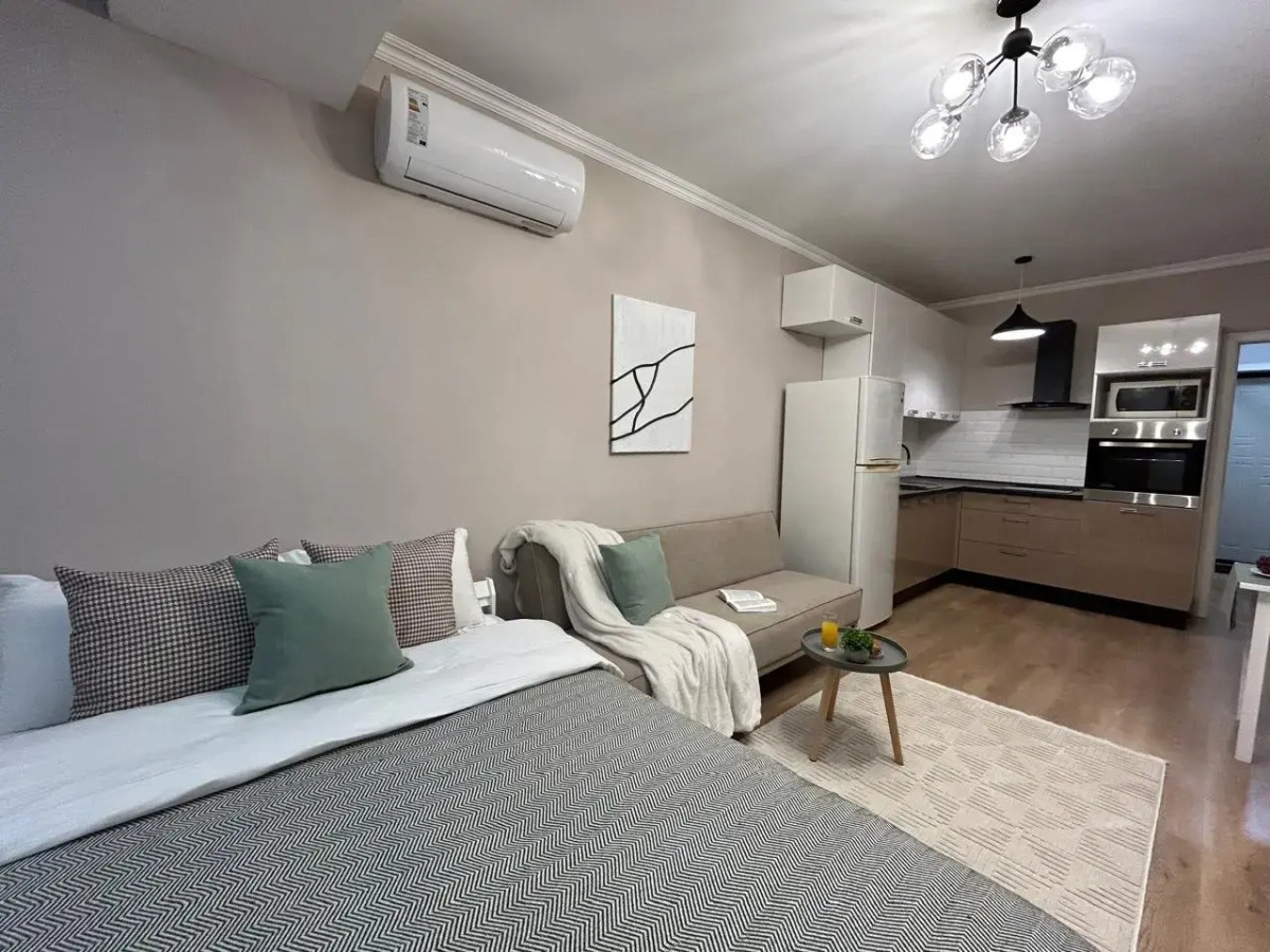 Апартаменты Нежная и уютная студия Кашемир в сердце города