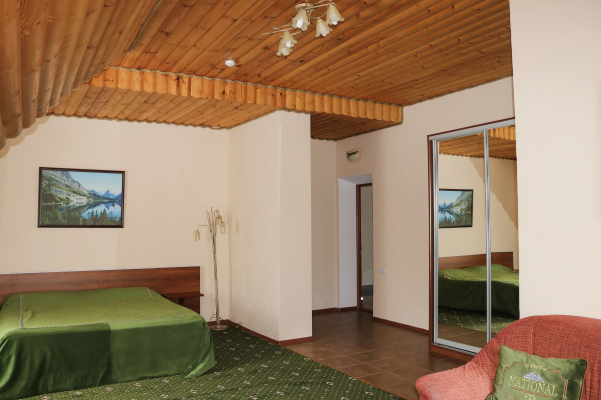 Отель NATIONAL Dombay