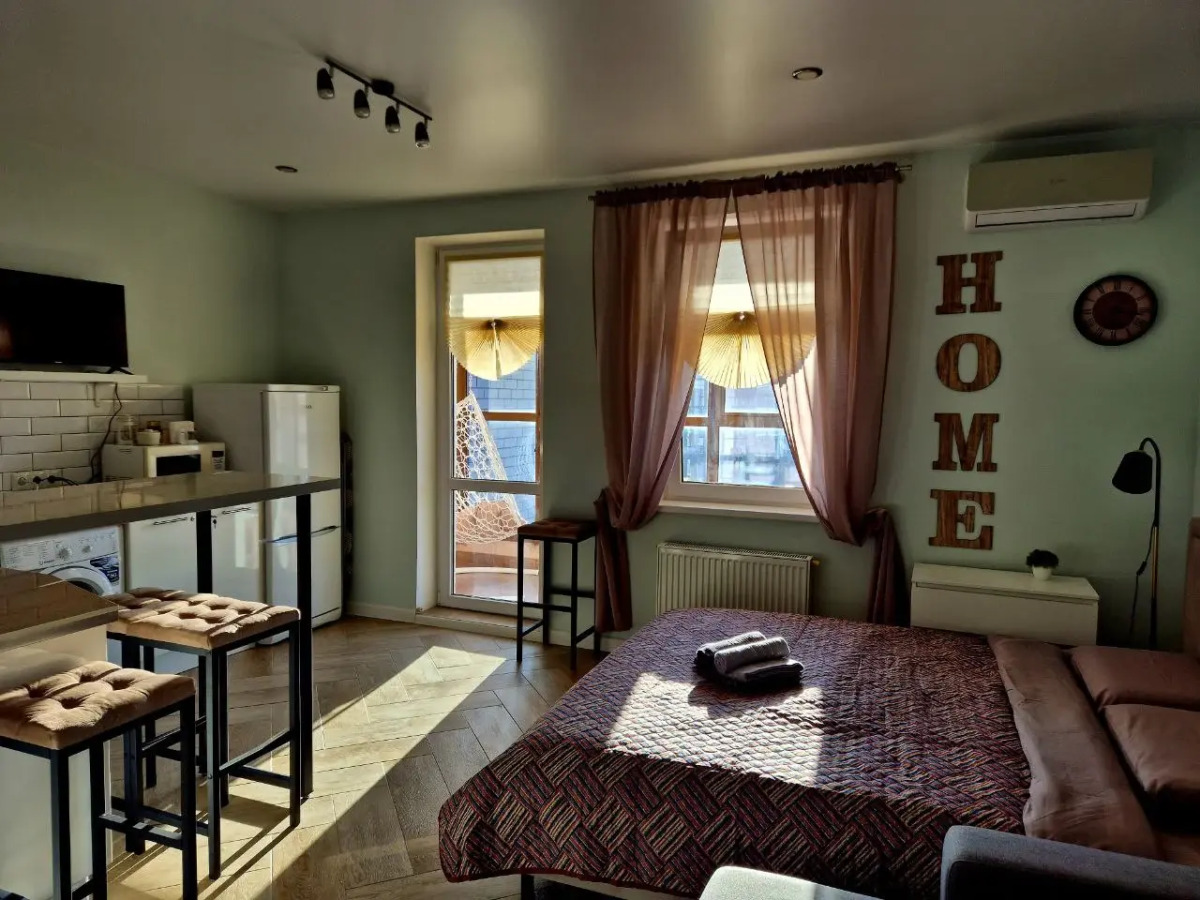 Квартира Современная студия с видом на Мамаев Курган около ЦПКиО