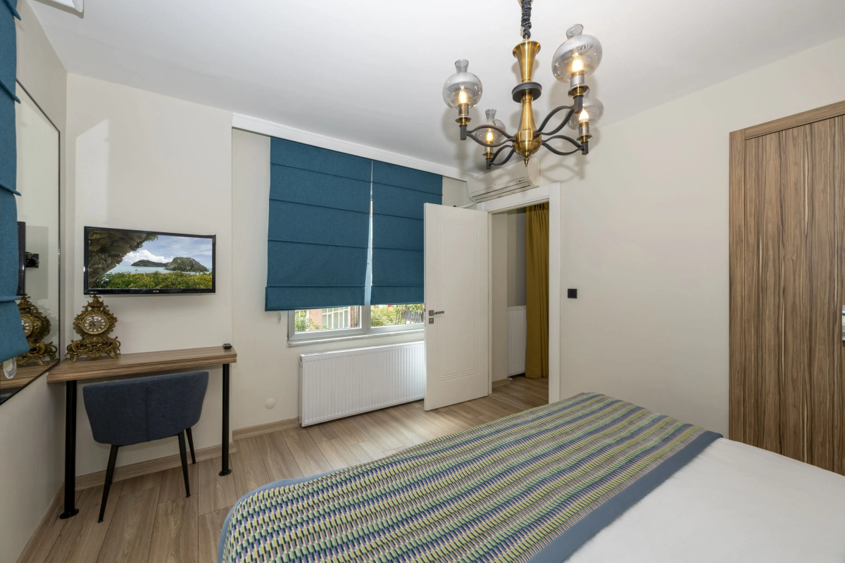 Отель The Marions Suite