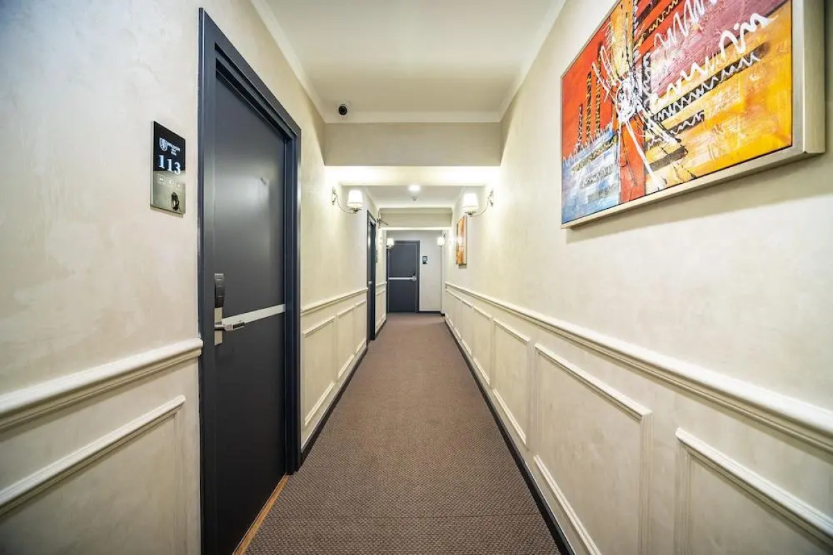 Отель Mildom City