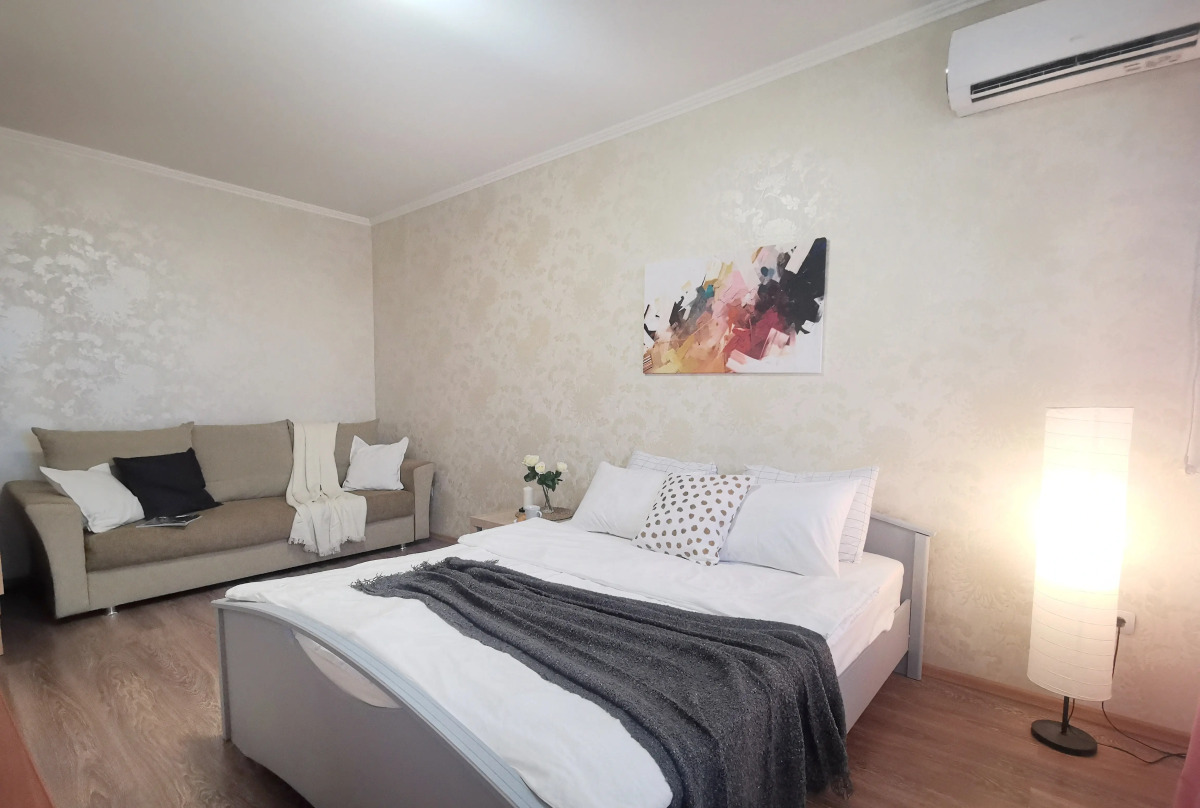 Апартаменты Уютная и светлая в самом центре города