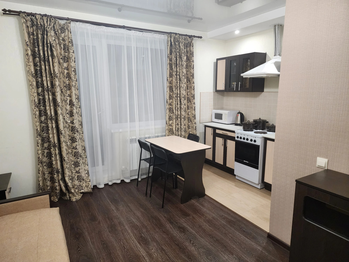 Апартаменты Студия Заря с Видом на Город Рядом с Вокзалом