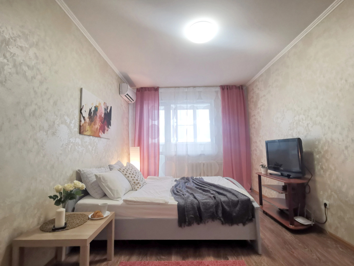 Апартаменты Уютная и светлая в самом центре города