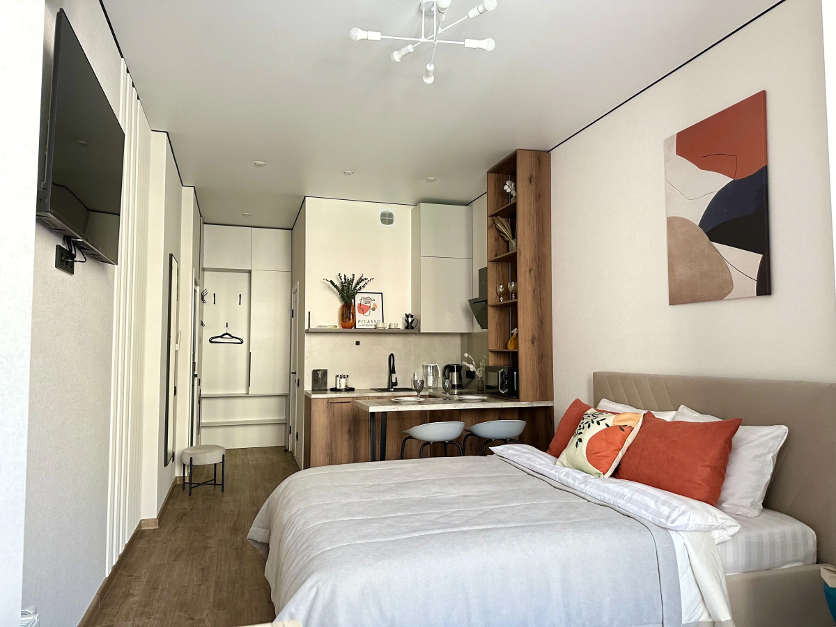 Апартаменты Уютная студия рядом с Аквапарком и Чашей