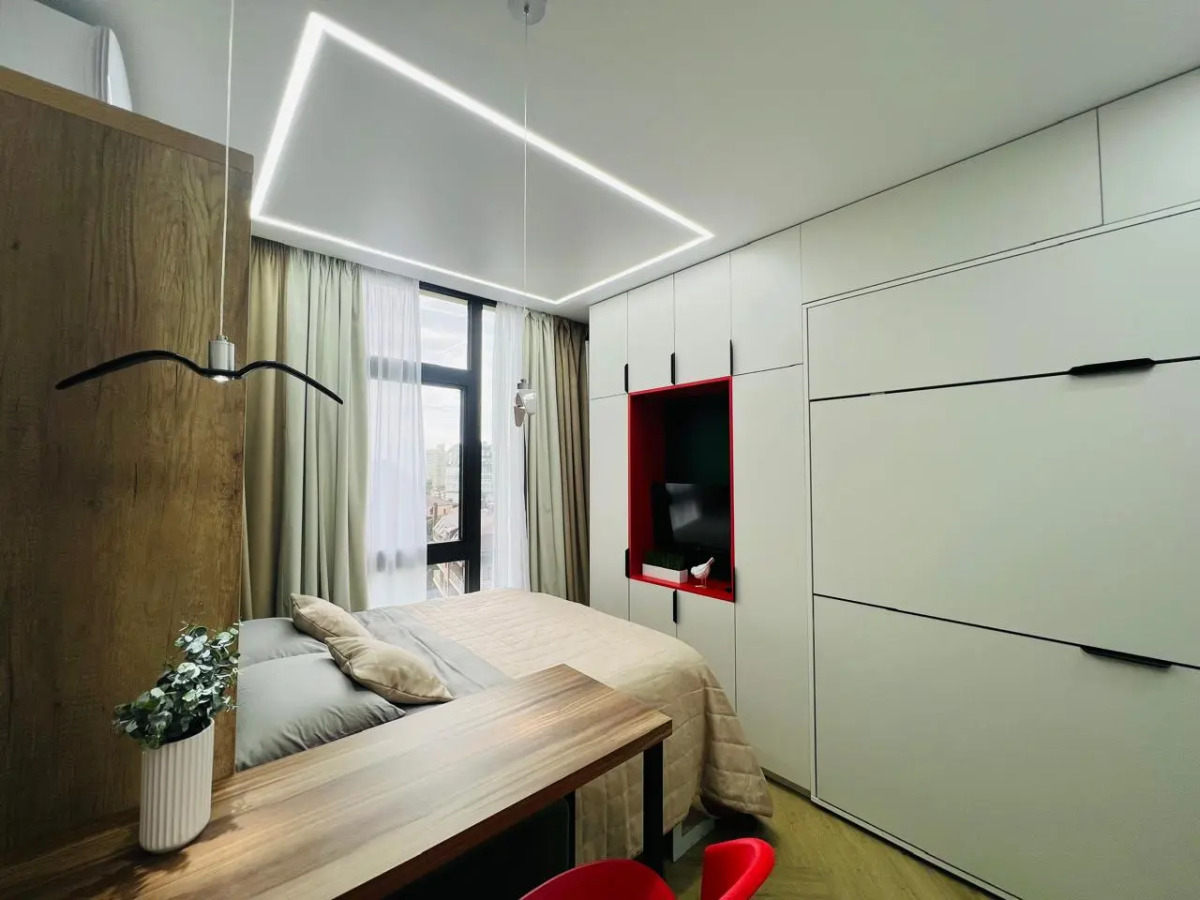 Апартаменты Студия с дизайнерским ремонтом с бассейном на крыше