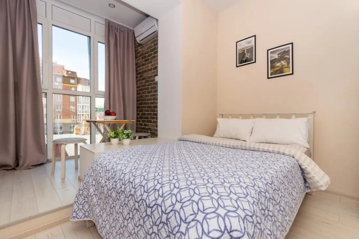 Апартаменты Мини студия с Панорамным Окном и парковкой