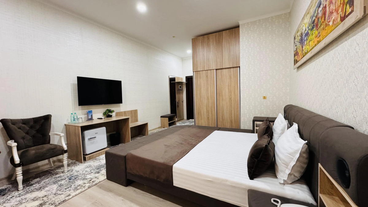 Отель Sharq Yulduzi