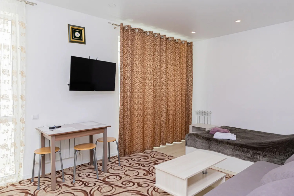 Апартаменты Современная студия на Мира 300