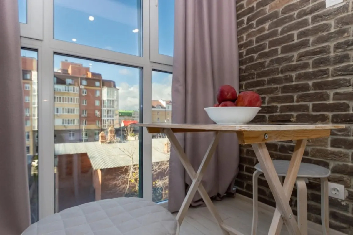 Апартаменты Мини студия с Панорамным Окном и парковкой