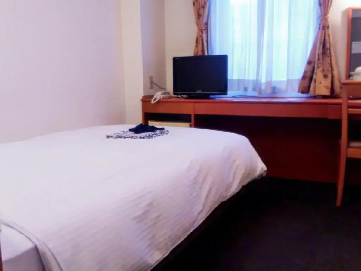 Отель Natural Hot Spring Midosuji Hotel