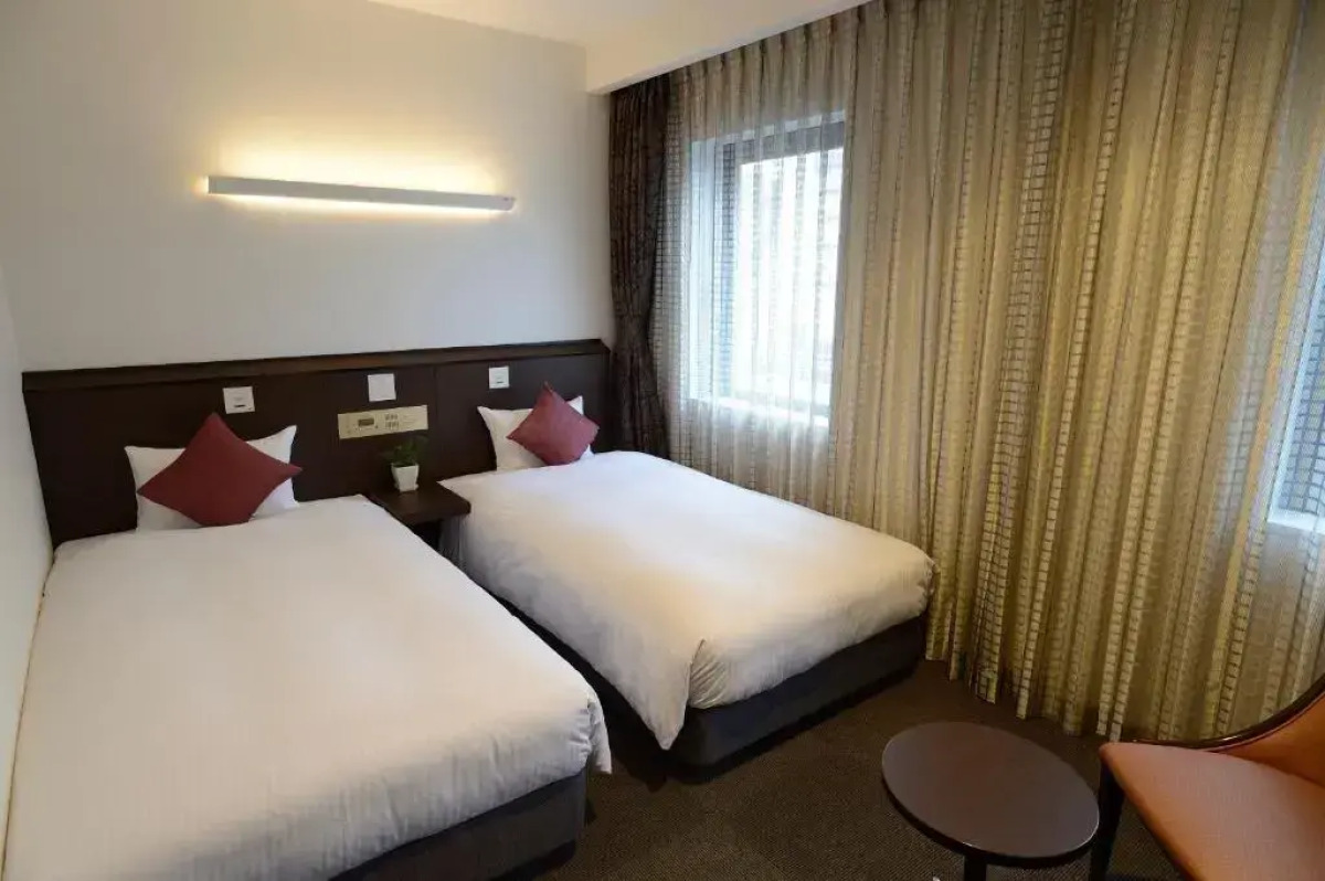 Отель Natural Hot Spring Midosuji Hotel