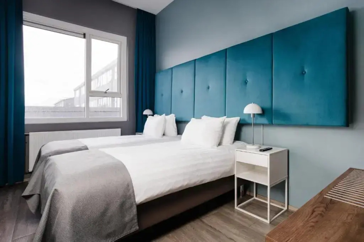 Отель Oddsson Midtown 