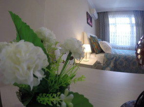 Atam Hotel & Suites