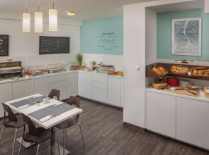 Escala Hotel & Suites