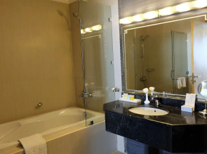 Magnum Hotel & Suites West Bay