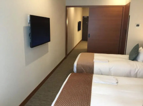 Odysis Suites Osaka Airport Hotel