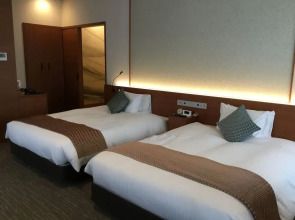 Odysis Suites Osaka Airport Hotel