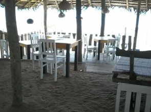 Malika's Yellow House