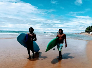 Malika's Yellow House