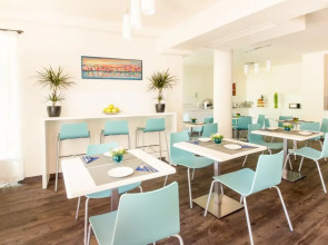 Escala Hotel & Suites