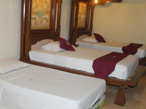 Отель Melasti Kuta Beach Hotel and Spa