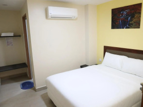 Capital O 90897 Island City Hotel