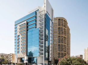 Отель Chirag Plaza Hotel & Business Center