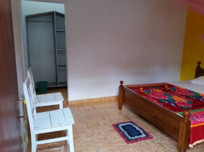 Malika's Yellow House