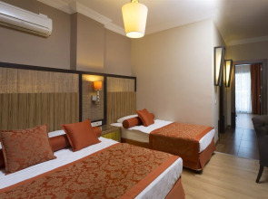 Quattro Beach Spa & Resort Hotel